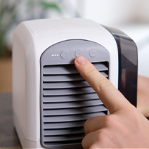 Image of a hand powering Polar Cooling on